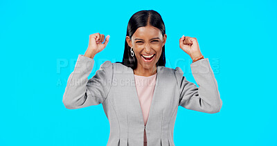 Buy stock photo Excited business woman, fist pump and celebration for winning promotion against a blue studio background. Portrait of female person or employee smile in success for bonus, achievement or good news