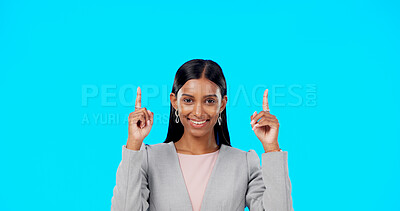 Buy stock photo Mockup studio portrait, happy woman or pointing up at business advertising info, company news or sales announcement. Corporate space, service deal and professional brand ambassador on blue background