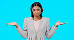Call center, portrait or woman confused with choice, doubt or opinions in studio isolated on blue background. Decisions, mockup space or Indian girl with confusion at telecom crm customer services
