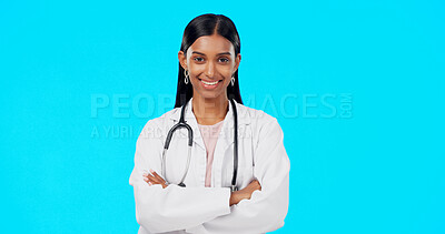Buy stock photo Happy woman, portrait and professional doctor with arms crossed in healthcare against a blue studio background. Female person, nurse or medical surgeon smile in confidence for health advice on mockup