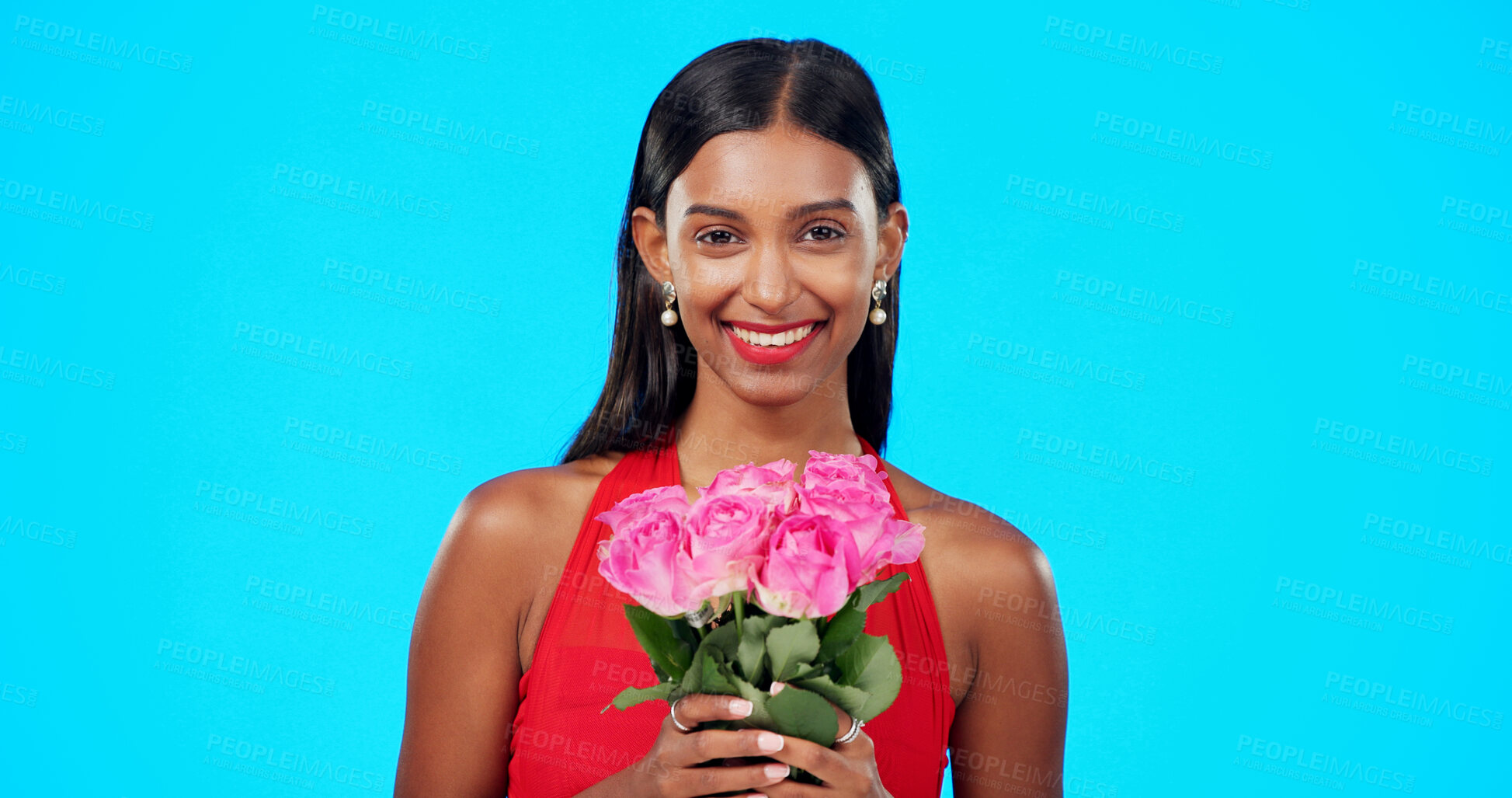 Buy stock photo Rose bouquet, romantic and woman portrait with gift, present and floral bunch for love and valentines day. Model, studio and happy female person with blue background and flowers with smile and makeup