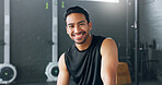 Fitness, exercise and laughing with a man in a gym for a workout or training to get strong or healthy. Wellness, smile and portrait with a happy young male athlete in a health club for exercising
