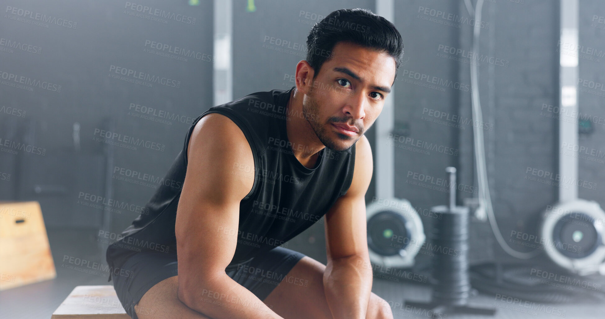 Buy stock photo Bodybuilder, portrait and serious man in gym for fitness, training or healthy stress management exercise or sport. Asian, athlete and motivation for wellness and workout in club for mental health