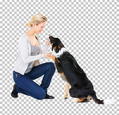 Woman, dog and paw in studio for training, learning and greeting with smile by isolated on a png background. Trainer, healthy pet animal and friends for teaching, love and care while isolated with happiness
