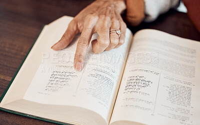 Buy stock photo Islamic, muslim and Quran with hand of old woman reading holy book for prayer, worship or ramadan kareem celebration. Arabic, God and religion with lady and dua for spiritual, faith and eid mubarak