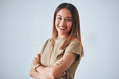 Buy stock photo Woman, proud portrait and happiness with arms crossed of a gen z female in a studio with gray background. Isolated, happy and smile from a person feeling motivation, youth and confidence with pride