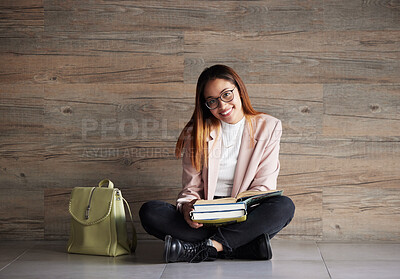 Buy stock photo University, portrait of happy woman on floor with books on mockup space and education at college. Information, knowledge and backpack, student sitting on wall background with smile and book to study.