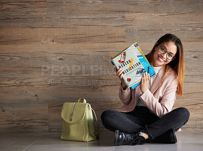 Buy stock photo Portrait, smile and medical woman with a book for university, knowledge for medicine and education. Face, female student and person with happiness, studying and healthcare material against a wall