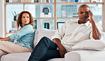 Conflict, fight and couple on sofa for marriage problems, frustrated and depression in living room. Bad communication, relationship and man and woman on couch for fighting, argument and divorce