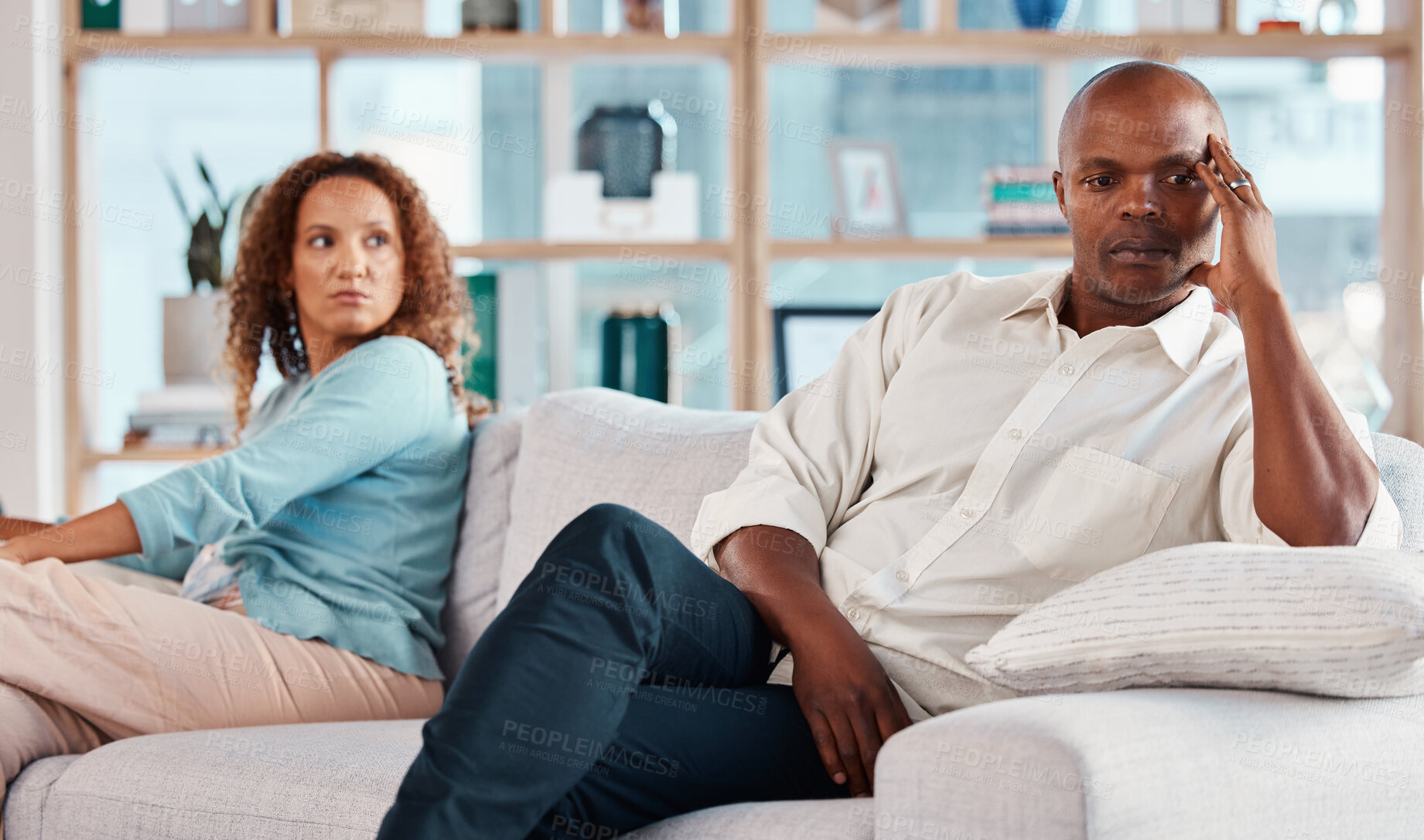 Buy stock photo Conflict, fight and couple on sofa for marriage problems, frustrated and depression in living room. Bad communication, relationship and man and woman on couch for fighting, argument and divorce