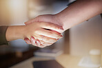 Partnership, handshake and closeup on business people for office agreement, deal or thank you at night. Employees shaking hands in collaboration, welcome or team support of trust, promotion and hello