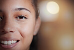 Beauty, half face and portrait of a woman with a smile and positive happy mindset by bokeh. Happiness, excited and female model with a cosmetic facial treatment by a blurry background with mockup.