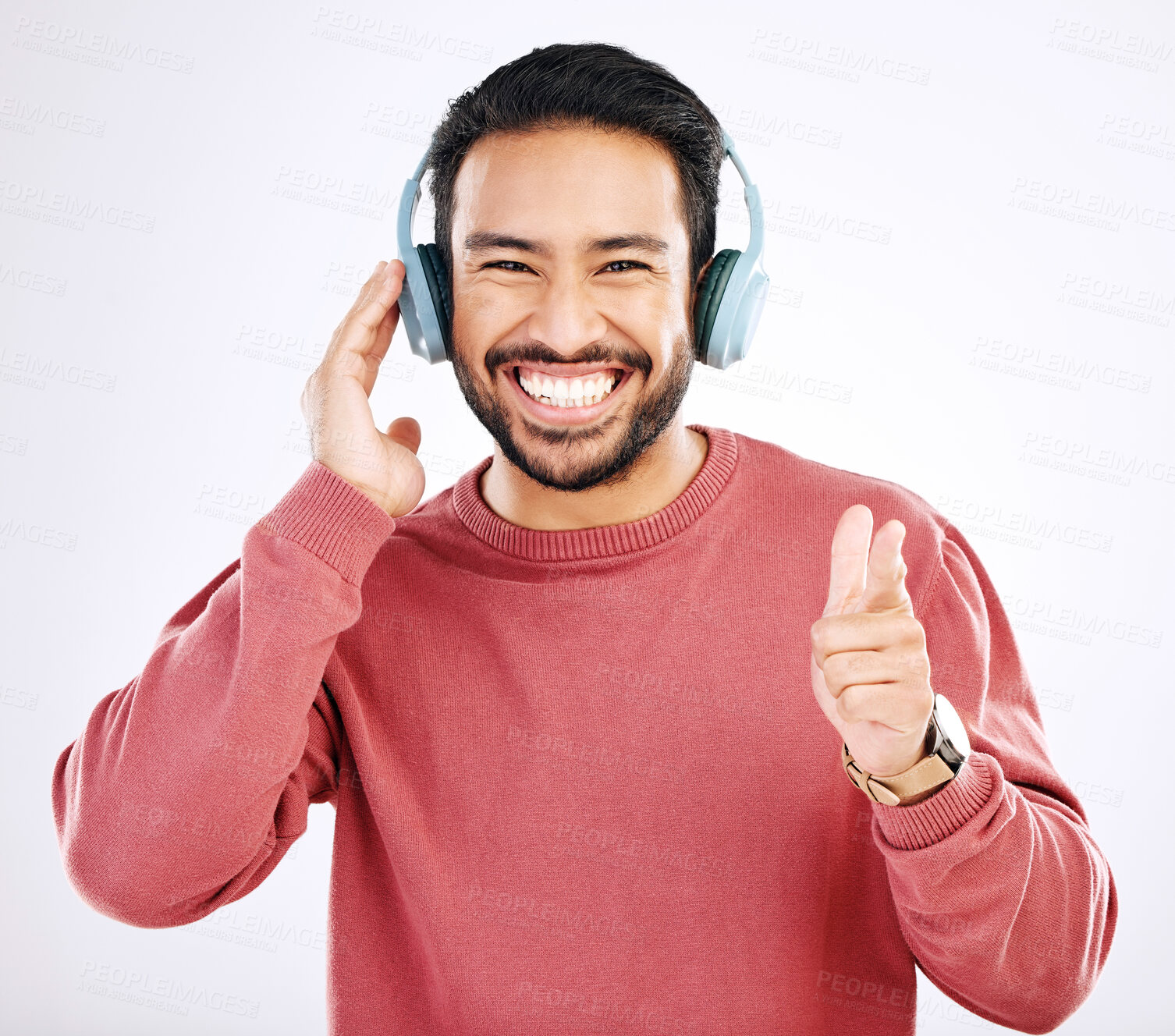 Buy stock photo Headphones, smile and music, excited man in studio isolated on white background streaming radio and happiness. Podcast subscription, technology and song, Indian guy listening to audio online to relax