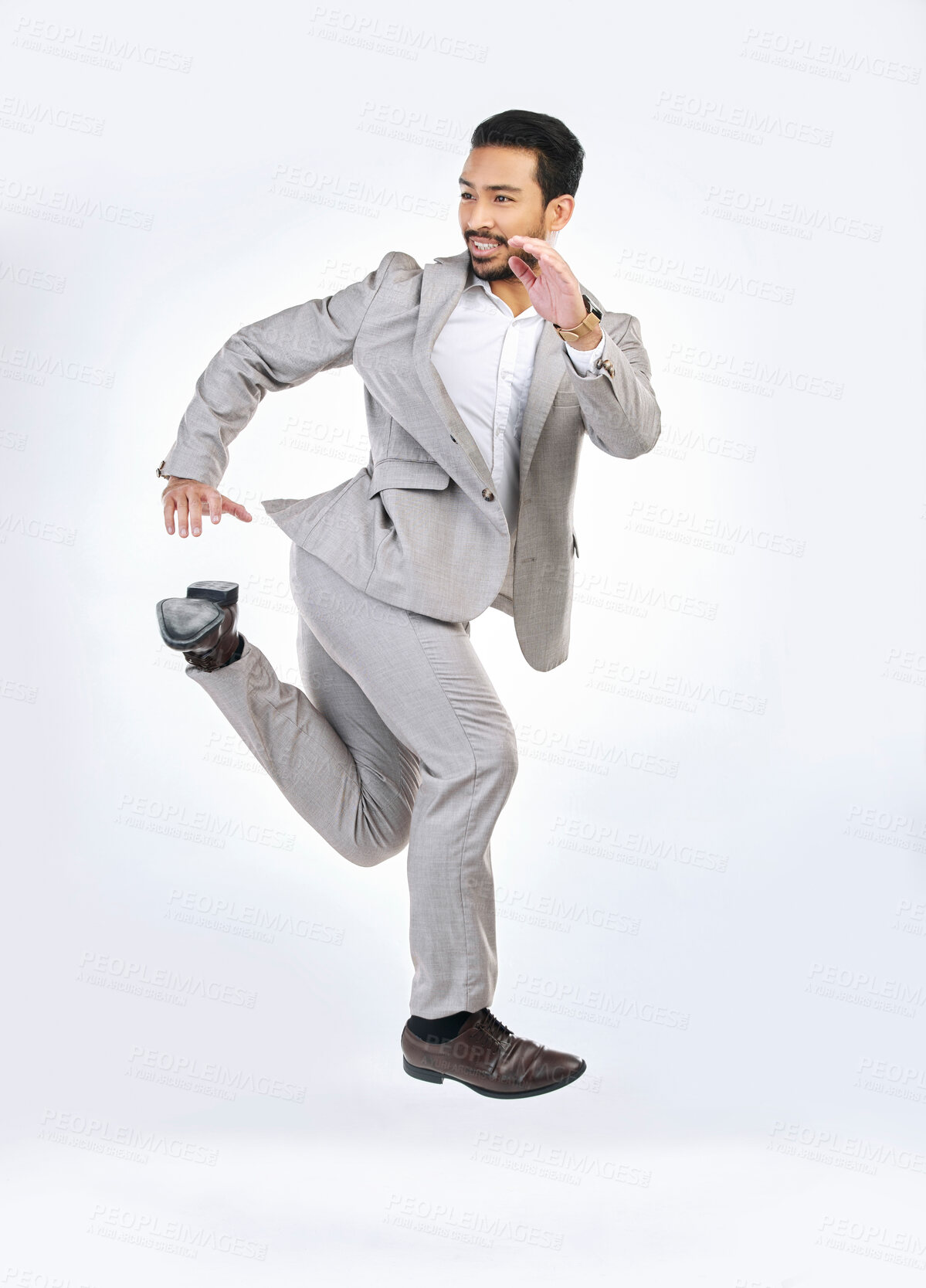 Buy stock photo Running, rush and business man late for work jumping, hurry and sprint for appointment in studio. Corporate mockup, time management and Asian male isolated on white background in run to workplace