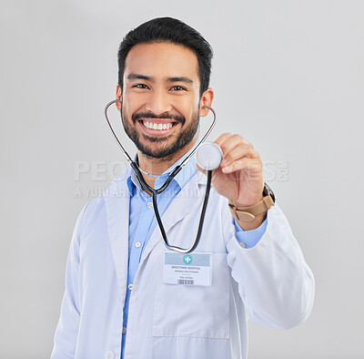 Buy stock photo Doctor, man and listen with stethoscope in portrait with smile and cardiovascular health isolated on white background. Medical professional, happy male physician in studio and cardiology and surgeon