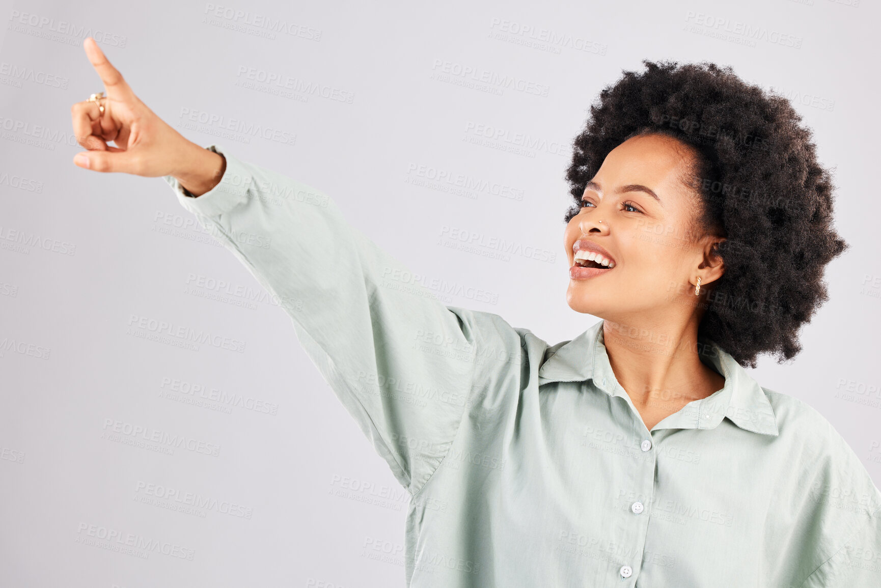 Buy stock photo Point, happy and black woman in studio smile with hand gesture for news, announcement and deal. Mockup space, white background and isolated girl pointing for promotion, product placement and showing