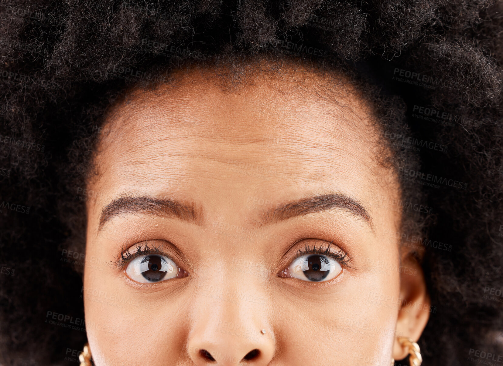 Buy stock photo Shock, expression and the portrait closeup of a black woman with an afro on a studio background. Wow, express and an African girl expressing shock, surprise and amazement with face in disbelief