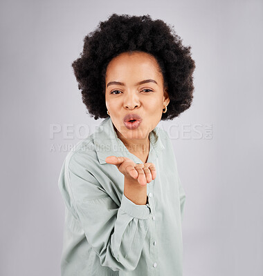 Buy stock photo Portrait, woman and blowing kiss in studio, white background and backdrop of love, care or flirt. Face of happy female model, hands and kissing emoji for romance, happiness or smile on valentines day