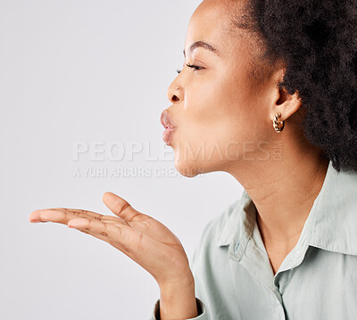 Buy stock photo Love, blow kiss and woman profile in a studio with romance, care and happiness. Isolated, white background and young female model with mockup and pout showing loving and mouth kissing gesture