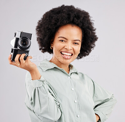 Buy stock photo Portrait, camera photographer and black woman smile in studio isolated on a white background. Photography, professional and happy person or female ready to start filming, photoshoot or taking picture