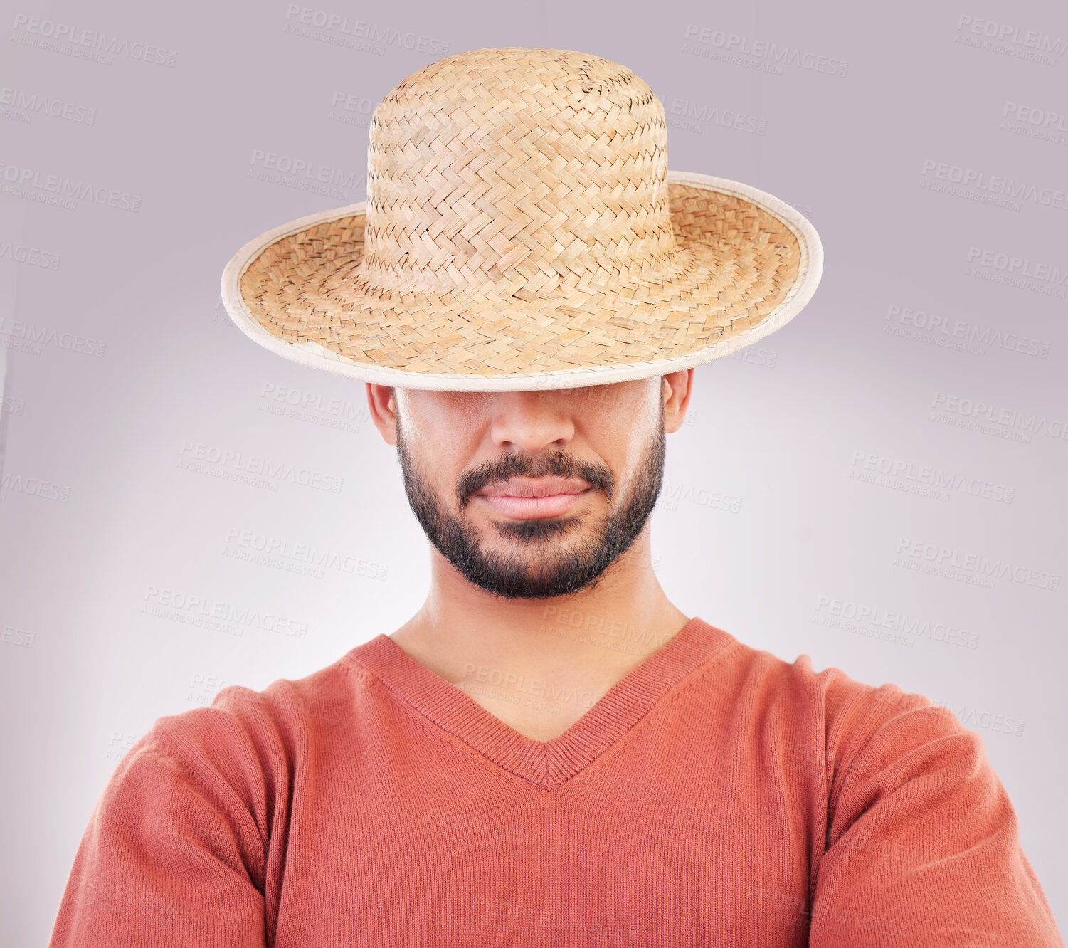 Buy stock photo Man, hat and face in fashion style, hidden identity or profile standing isolated against a white studio background. Casual male model posing and wearing straw cap or stylish accessory covering eyes