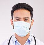 Covid, doctor and portrait of man in studio with protection, safety or corona compliance on white background. Face, mask and male healthcare worker at hospital for treatment and disease prevention