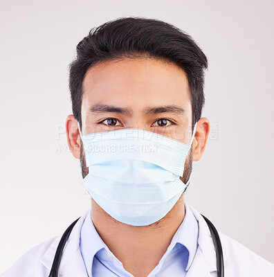 Buy stock photo Covid, doctor and portrait of man in studio with protection, safety or corona compliance on white background. Face, mask and male healthcare worker at hospital for treatment and disease prevention