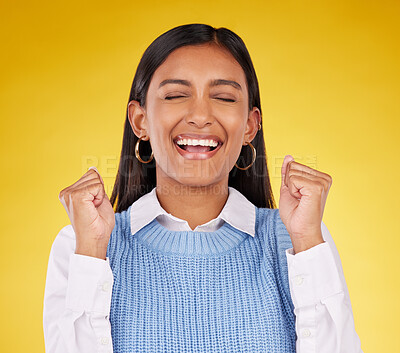 Buy stock photo Celebration, winner and fist pump with woman in studio for success, excited and happy cheering. Wow, yes and achievement with female on yellow background for victory, promotion and good news