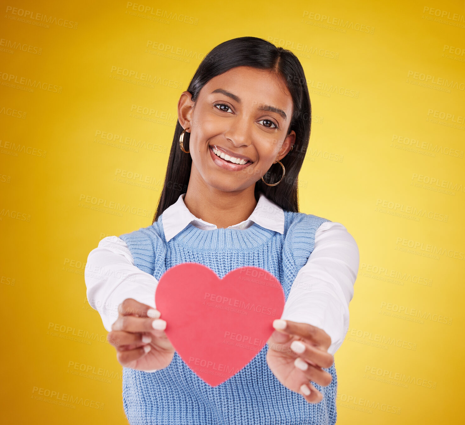 Buy stock photo Giving, paper and heart with portrait of woman in studio for love, support and romance. Valentines day, kindness and date with female and symbol on yellow background for health, happiness and hope