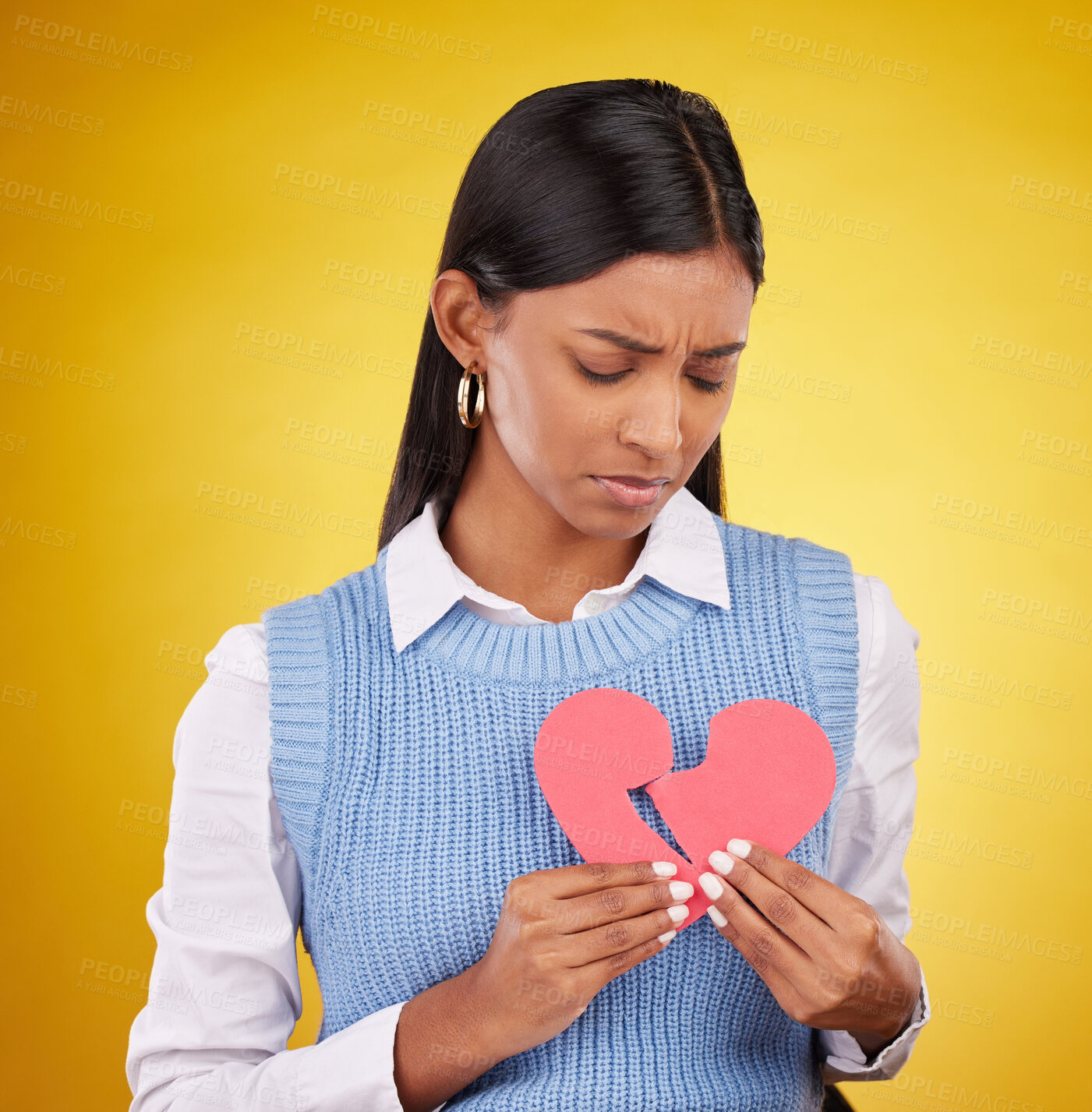 Buy stock photo Sad, unhappy and woman with broken heart, depression and problems against a studio background. Female, depressed and person with tear, symbol for love cracked and issue after breakup and anxiety