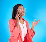 Happy business woman, phone call and conversation for communication or consulting against a blue studio background. Creative female employee talking on mobile smartphone in discussion for startup