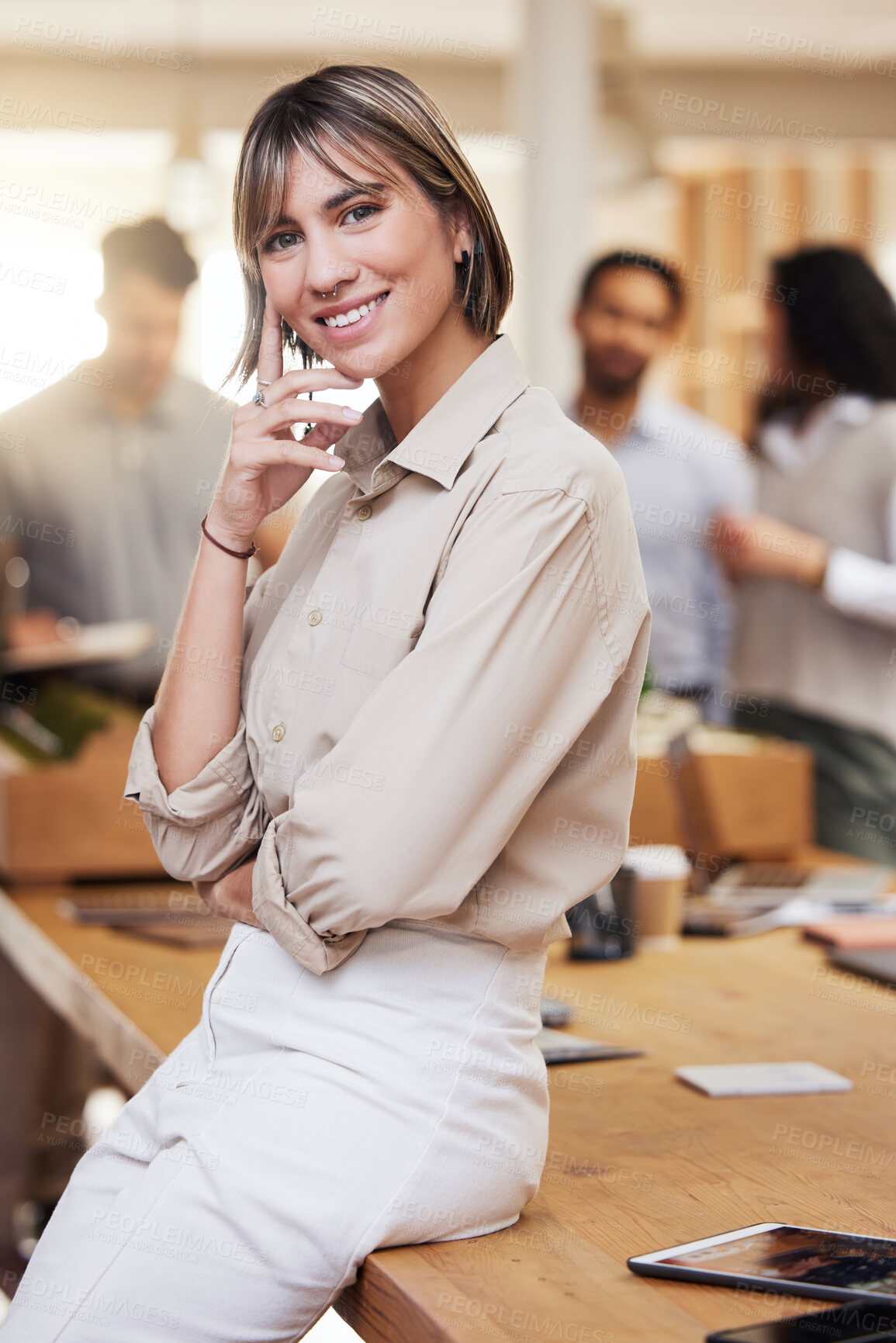 Buy stock photo Portrait, meeting and boardroom with a business woman in the office for planning, strategy or management. Training, seminar and smile with a happy female employee sitting on a table during a workshop