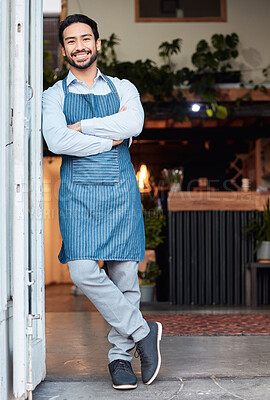 Buy stock photo Happy, arms crossed and portrait of an Asian man at a restaurant for a welcome, service and job at the door. Smile, working and a Japanese waiter at entrance of a cafe of coffee shop in the morning