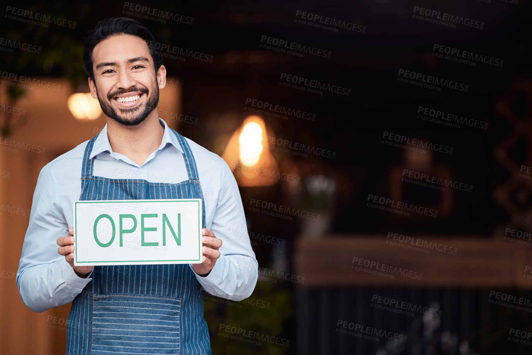 Buy stock photo Happy asian man, small business and open sign for service in coffee shop or restaurant. Portrait of male entrepreneur, manager or waiter holding billboard or poster for opening retail store or cafe