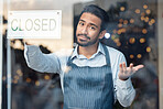 Portrait, business and Asian man with closed sign, coffee shop and closing with recession. Male employee, entrepreneur or manager closing restaurant, financial crisis or bankruptcy with loss of money