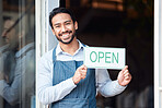 Happy asian man, small business and portrait with open sign for service in coffee shop or restaurant. Male entrepreneur, manager or waiter holding billboard or poster for opening retail store or cafe