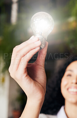 Buy stock photo Light bulb, ideas and woman with inspiration, thinking and clean energy for sustainability. Female, glow and girl with motivation, creativity and thoughts for project, inspire and creation for growth
