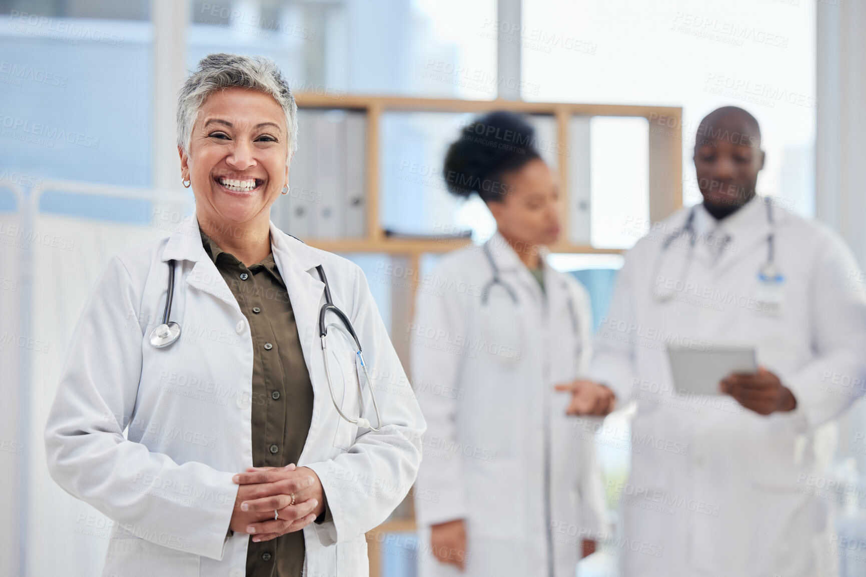 Buy stock photo Hospital, doctor and portrait of senior woman in healthcare clinic for insurance, wellness and medical service. Medicine, leadership and female health worker smile for professional care and help