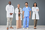 Hospital, doctors and portrait of people on wall background for insurance, wellness and medical service. Healthcare, teamwork and men and women standing in line for consulting, help and mockup space