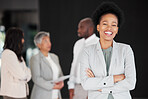Black woman, portrait smile and business leadership for meeting, planning or teamwork collaboration at the office. Happy and confident African American female smiling with arms crossed for management