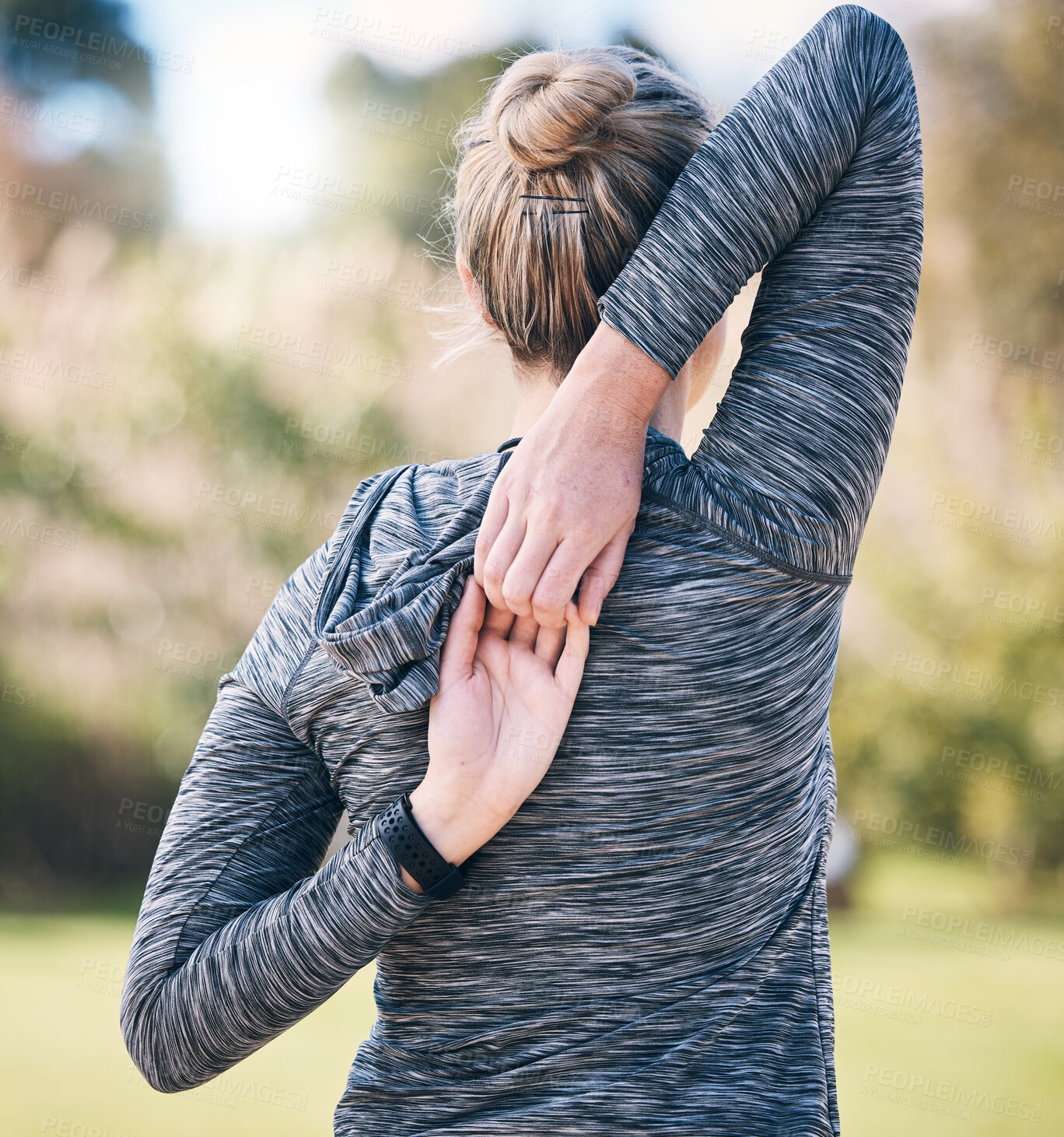 Buy stock photo Back of woman, fitness and stretching arms for exercise, training and sports in park. Female athlete warm up for workout, performance and energy outdoors in nature, wellness and runner commitment 