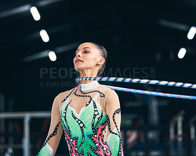 Buy stock photo Woman, gymnastics and spinning hoop on neck for competition, sports training and action in arena. Female dancer, rhythmic movement and athlete with loop for dynamic solo concert, event or performance