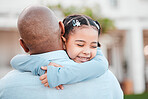 Family, hug and father with girl in garden for bonding, quality time and childcare outdoors. Love, embrace and dad hugging happy child with smile on summer vacation, weekend and holiday at home