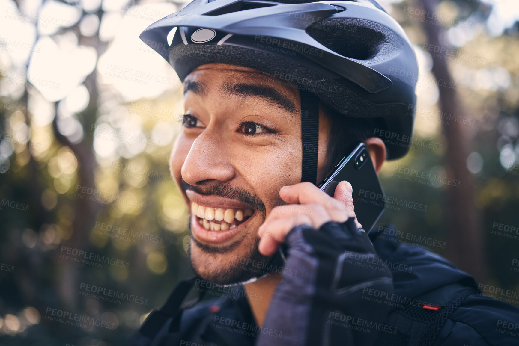 Buy stock photo Sports, face of man and phone call outdoor for cycling, mountain bike or workout and smile in nature. Male person in forest with smartphone for communication, contact or talking fitness with helmet