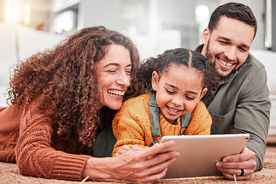 Buy stock photo Happy family on floor with tablet, kid and movies, streaming service for child development video for education. Mom, dad and girl on carpet, happiness and smile, digital entertainment in living room.