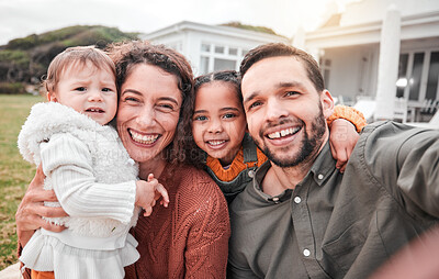 Buy stock photo Love, selfie and family outdoor, smile and bonding with quality time, carefree and relax together. Portrait, parents or mother with father, children or kids outside, interracial or happiness on break