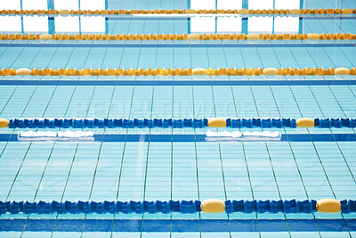 Empty, swimming pool or lines in water for competition or racing lanes for fitness or underwater sports. Cardio, blue or swim training arena ready for race performance, workout or exercise challenge