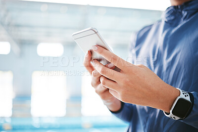 Buy stock photo Phone, hands and athlete texting at swimming pool for social media, web scrolling or online browsing after exercise. Swim sports, cellphone and woman typing on internet chat after workout or training