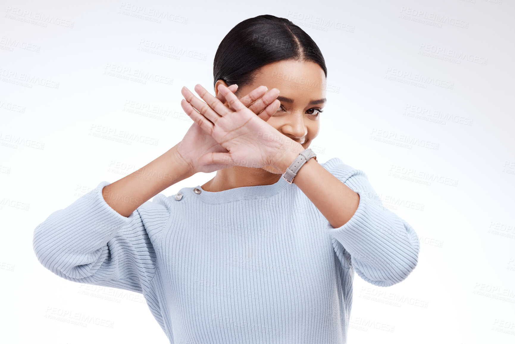 Buy stock photo Stop, hands and woman portrait in a studio showing palm and hiding with protest. Isolated, white background and shy female with emoji hand gesture for protection and defense icon for reject