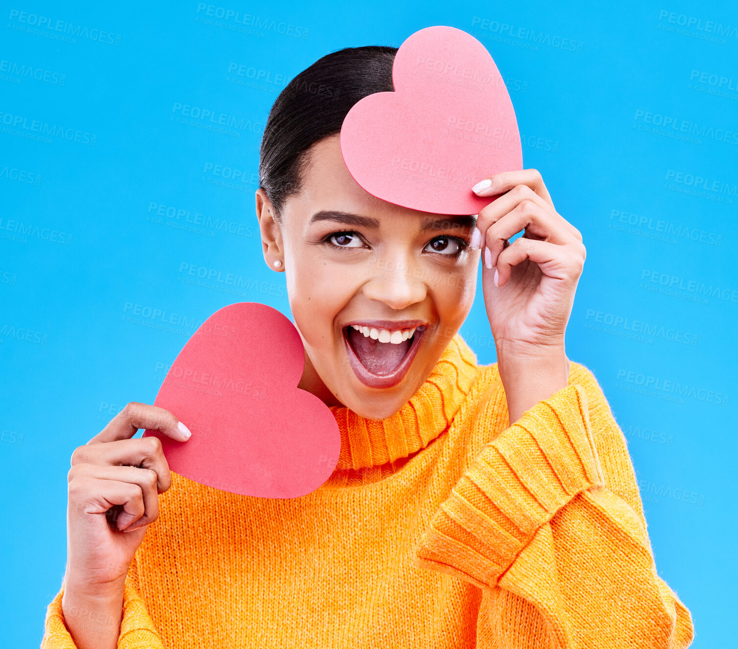 Buy stock photo Paper heart, excited woman and surprise on blue background, studio and emoji icon. Happy female model, love and shape of sign, wow and celebration of peace, thank you and kindness for valentines day